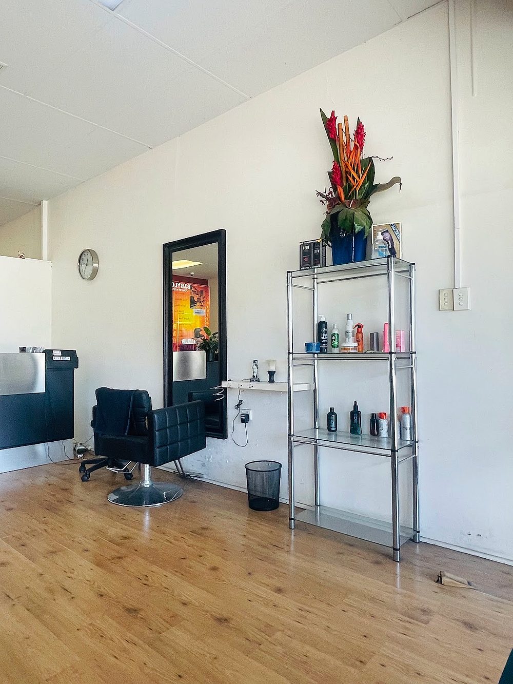 Styling chair and product shelf inside the salon